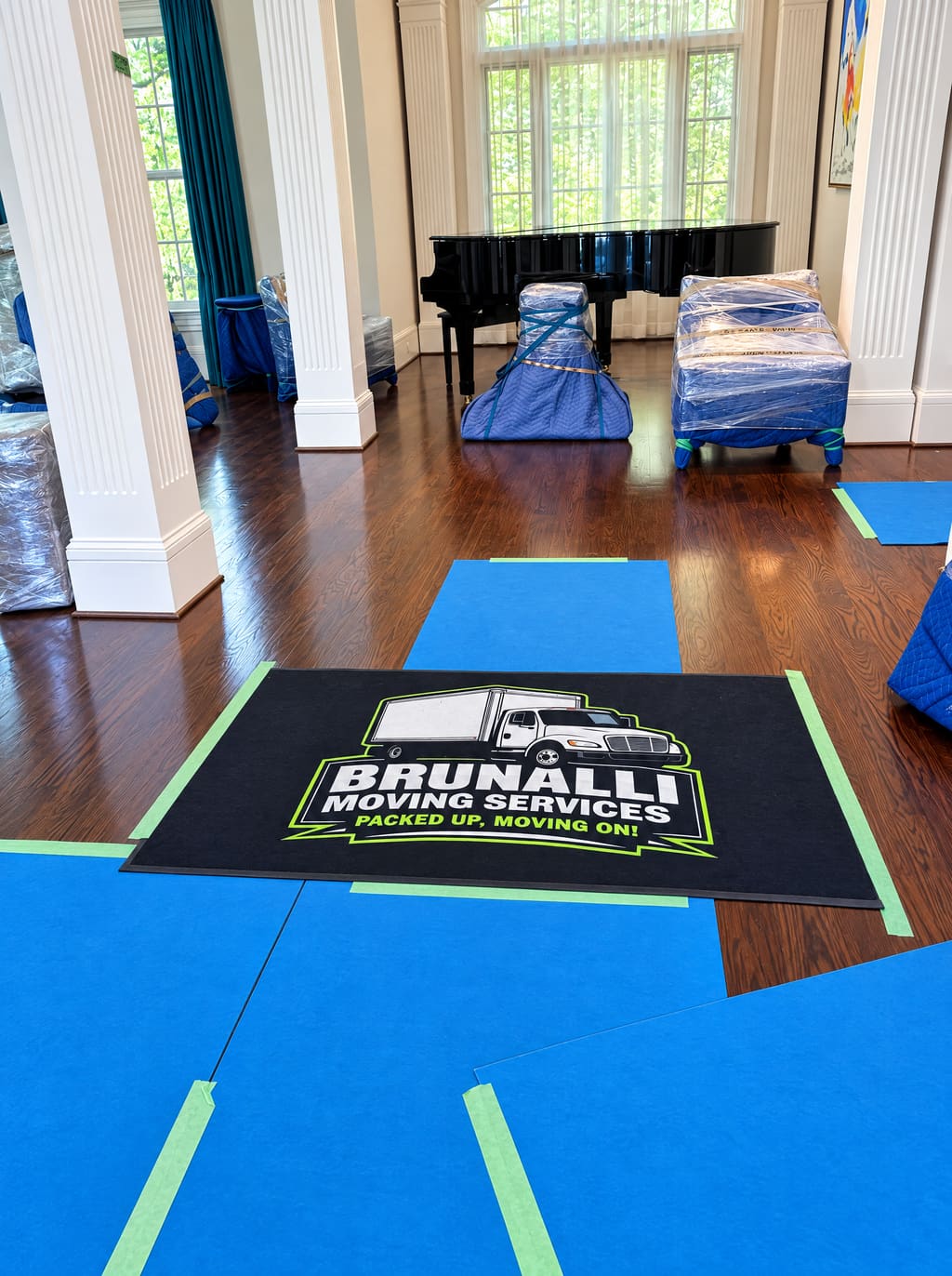 Brunalli floor mat in a foyer with a grand piano