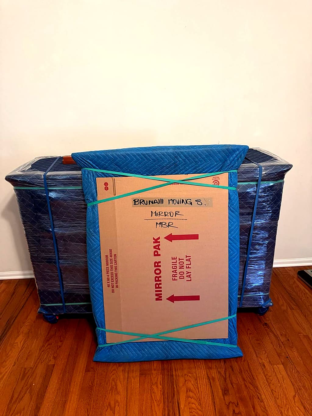 Wrapped piece and mirror box labeled MASTER