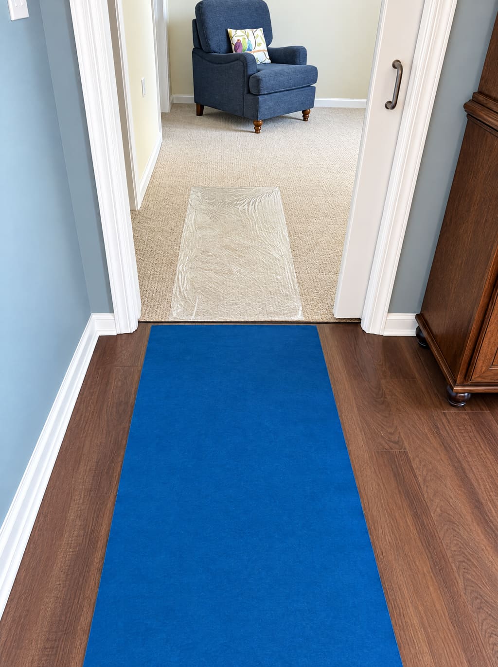 Blue runner through a doorway