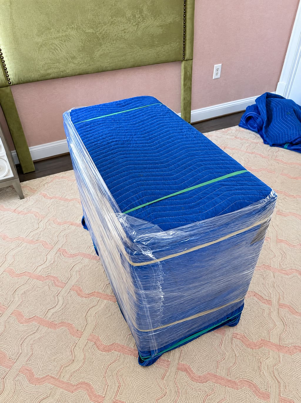 Bench wrapped in a blue moving pad